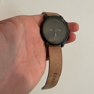 Used MVMT , great condition black face leather straps nice blue dial hands